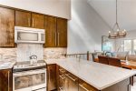 Fully equipped kitchen featuring granite counter tops